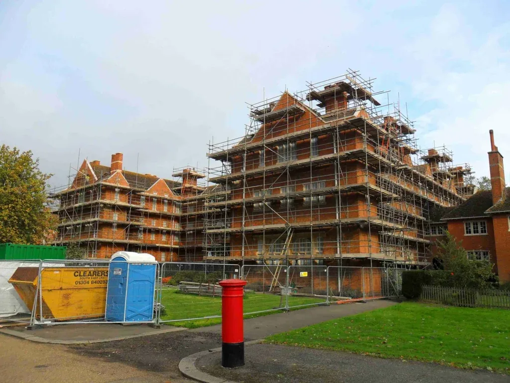 Scaffold around a large period manor house building